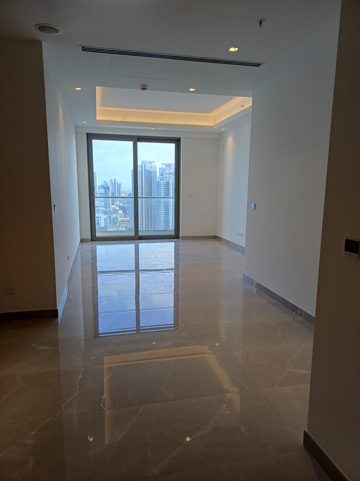 House exterior with spacious balcony and floor-to-ceiling windows